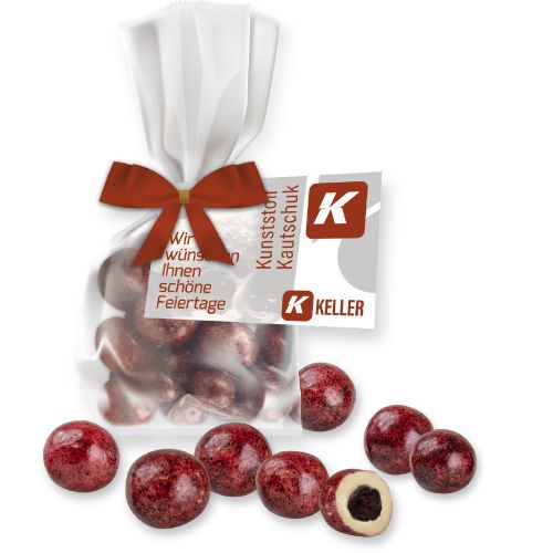 Currants in white chocolate, ca. 30g, express flat bag with bow with advertising card